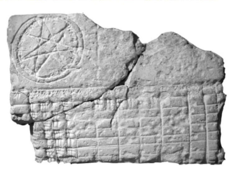 Photograph of a broken Mesopotamian clay tablet in two joined fragments. The upper left carries a circular seal with a five-pointed star; the rest is covered in ruled columns of cuneiform.
